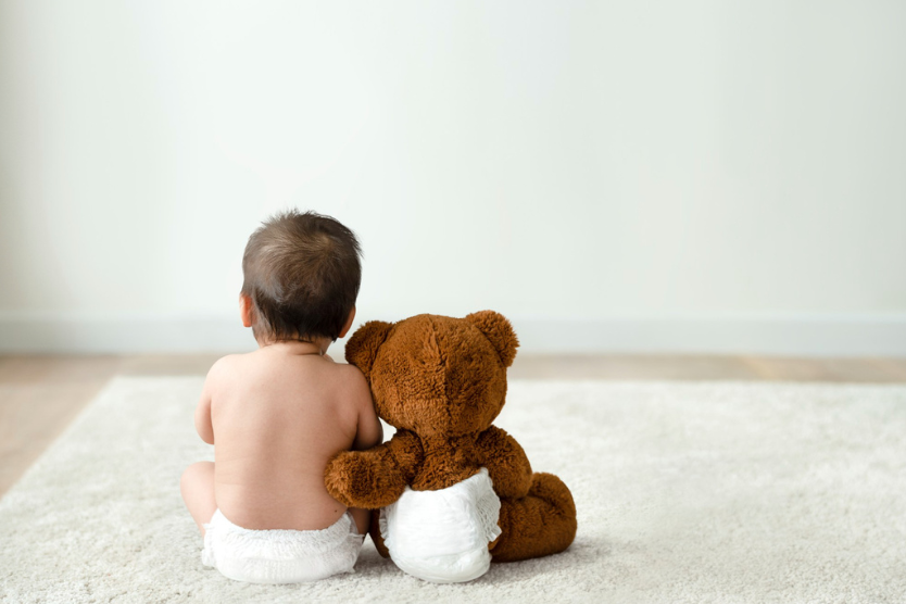 Baby & teddy with diapers