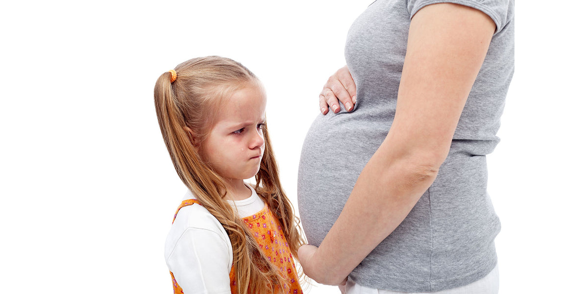 Girl with her Pregnant Mom