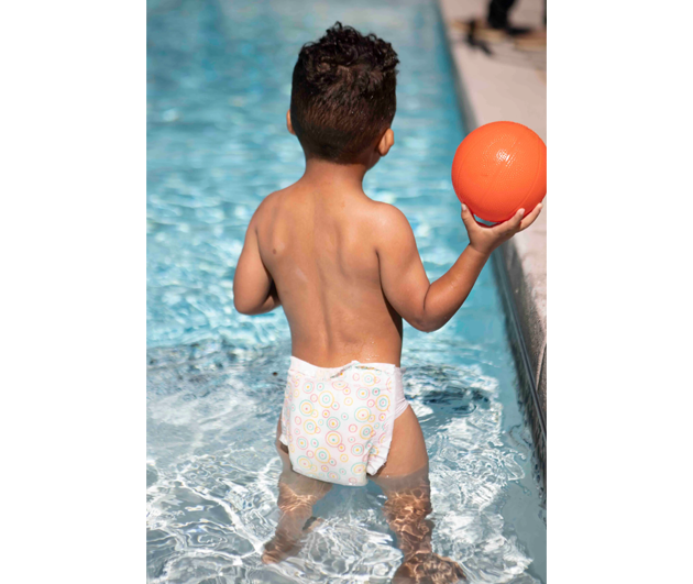 Little Toes natural disposable swim diapers in a pack of 24, featuring a colorful design for toddlers.